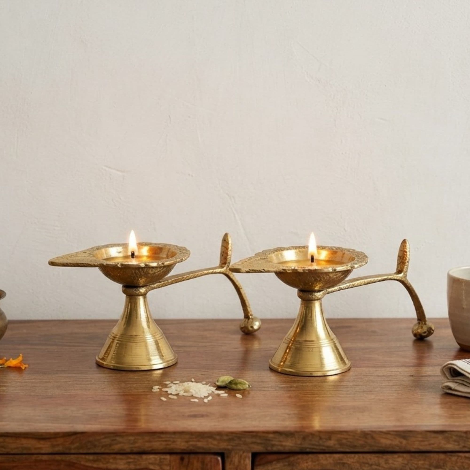 Traditional handcrafted brass diya pair, perfect for pooja, Diwali and home decor.